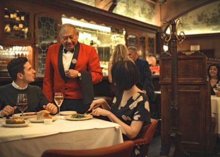 The red-jacketed servers and bartenders at Musso’s have become celebrities in their own right.