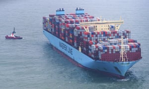 The ‘Mumbai Maersk’ lies surrounded by tugs in the North Sea near the island of Wangerooge, Germany, Thursday, Feb. 3, 2022.