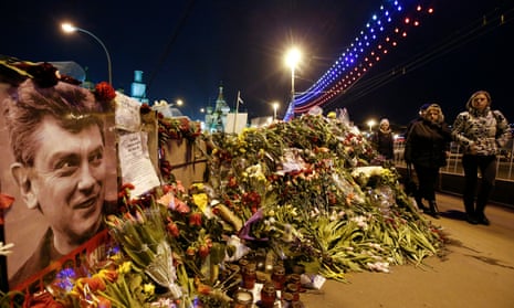 Flowers are laid at the site where Boris Nemtsov was killed in central Moscow in 2015.