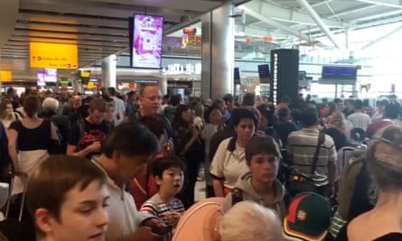 Passengers queuing at Heathrow Terminal 5, as BA cancelled flights after its IT meltdown.