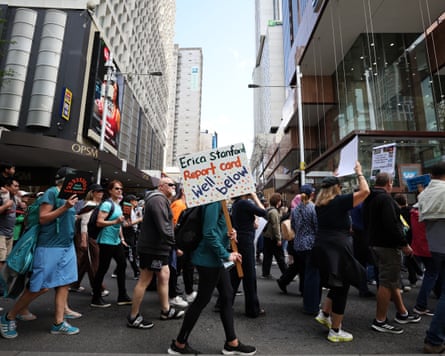 Education and healthcare workers and others rally in Auckland during the strike, one of New Zealand’s largest ever.