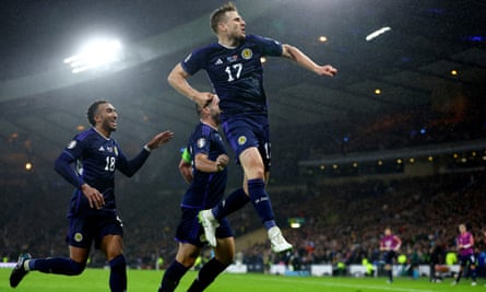 Stuart Armstrong celebrates scoring Scotland’s third goal with Jacob Brown and John McGinn.