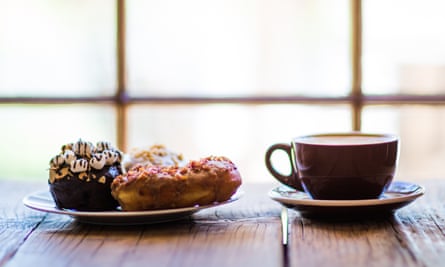 A cup of coffee and a plate of doughnuts at Short Leash Hotdogs, Phoenix, Arizona
