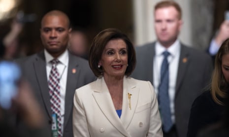 Nancy Pelosi walks to the House floor for the State of the Union address in Washington DC, on 4 February. 