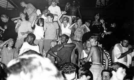 People dancing at an acid house party at White Waltham airfield.