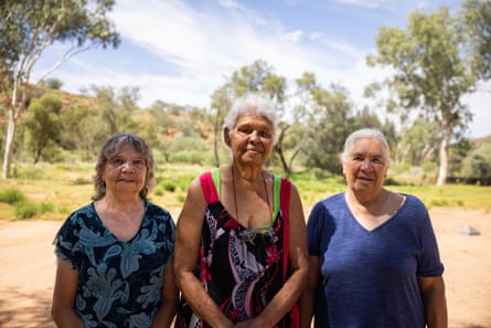 Western Arrernte elder Doreen Carroll (centre) with other Strong Grandmothers of Central Australia members Elaine Peckham (left) and Brenda Shields