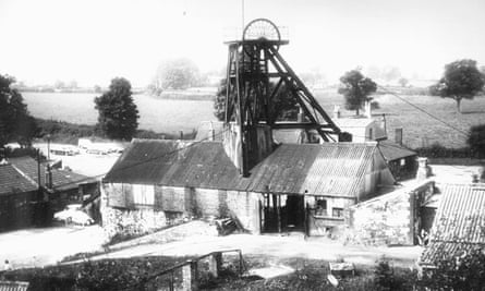 Black and white picture of the New Rock colliery, including the winding wheel