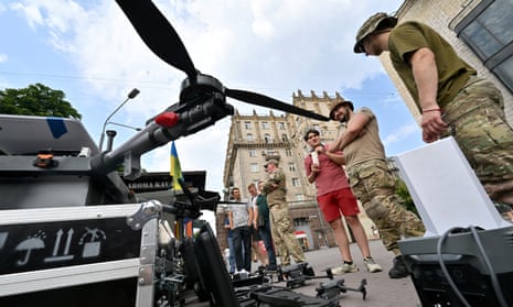 Drones on display at a Ukrainian military recruiting point in Kyiv