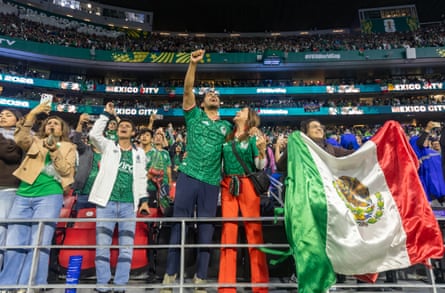 Fans of Mexico cheer at the Azteca Stadium after the win over Ecuador