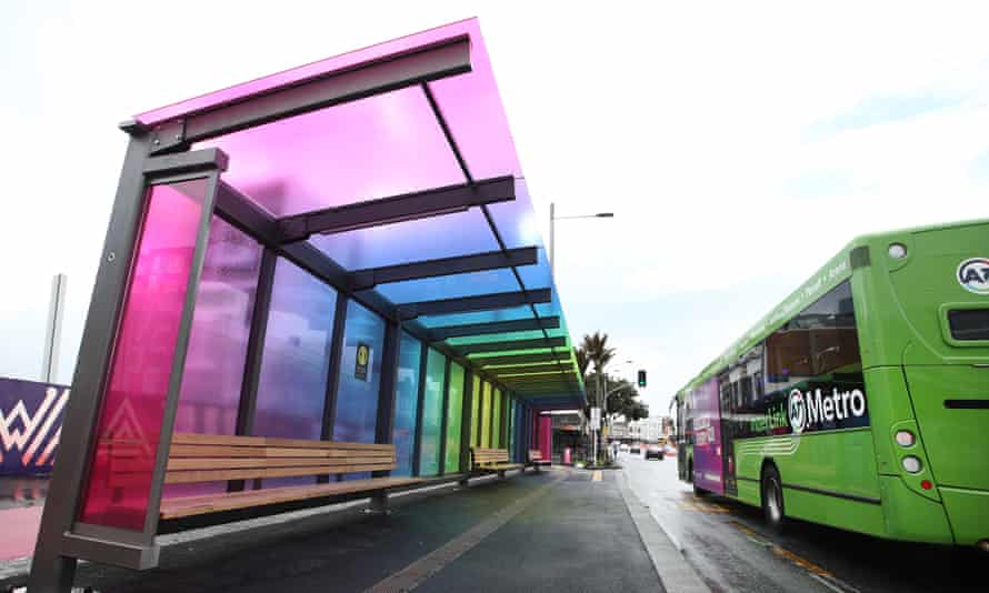 An Auckland Transport bus passes a Karangahape Rd bus stop