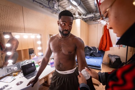 Pappa Essiedu has a tattoo applied as he prepares for his role as Delroy, for Death of England: Closing Time at Soho Place.