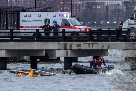 Pilot of crashed New York helicopter was reportedly low on fuel and headed back to helipad | New York helicopter crash | The Guardian
