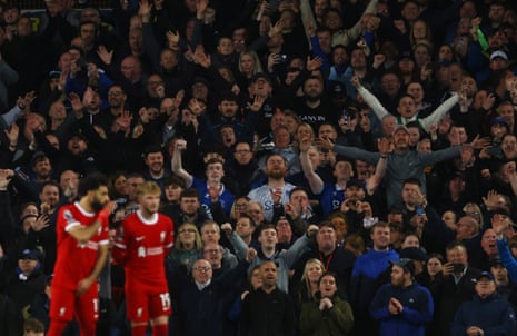 Everton fans celebrate during the match against Liverpool.