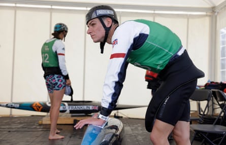 Jonny Dickson of Great Britain waits to weigh his boat at boat control during the final day of practice before the ICF Canoe Slalom World Championships 2023 at the Lee Valley White Water Centre