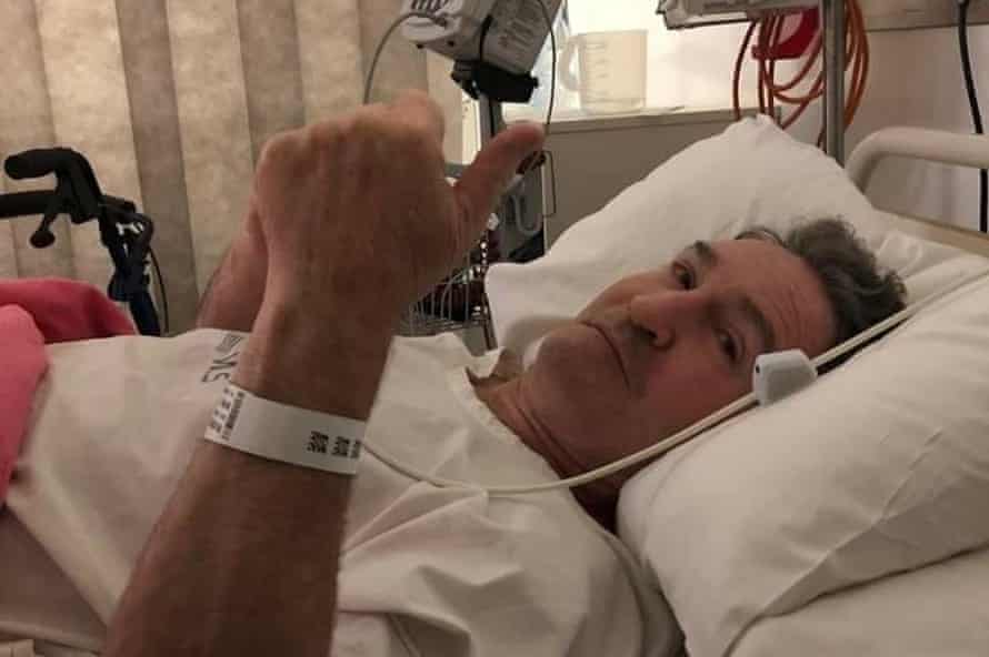 Andre Rivenell, in a Houston hospital after suffering a stroke while stranded overseas last year. He is not insured in America.