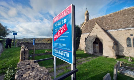 A 'Sold’ sign on a church in Shortwood near Nailsworth, Gloucestershire, UK, in 2013