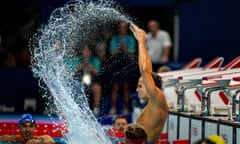 Ugo Didier of France celebrates by hitting the water after winning the Men's 400 Freestyle -S9, during the 2024 Paralympics, Thursday, Aug. 29, 2024, in Paris