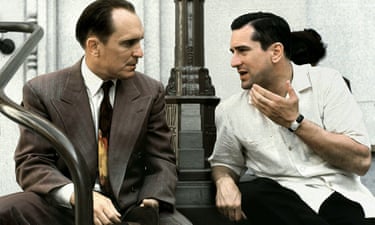 Duvall and De Niro facing each other as they talk