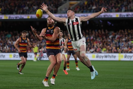 Riley Thilthorpe of the Crows competes with Daniel McStay of the Magpies at Adelaide Oval.