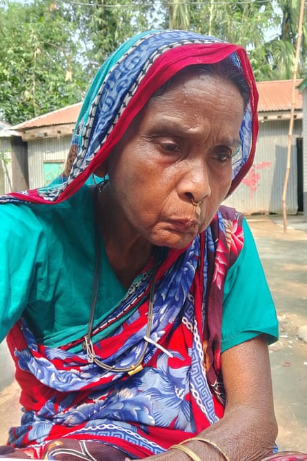An older Indian woman wearing a sari