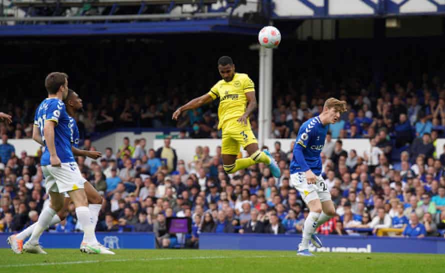 Brentford’s Rico Henry heads in his side’s third goal to put them 3-2 ahead.