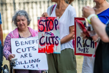 Pip protest about welfare cuts outside parliament.