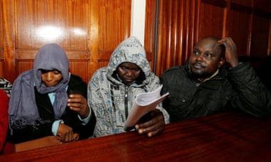 Kenyan police officers Sylvia Wanjiku, Stephen Cheburet and Fredrick Leliman sit in the dock at Milimani Law courts, Nairobi, Kenya, 2016.