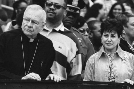 Gayle Benson, owner of the New Orleans Saints (R) and Gregory Michael Aymond, Archbishop of New Orleans, watch parades during Fat Tuesday celebrations on February 25, 2020 in New Orleans, Louisiana. Last week the New Orleans Saints went to court in an effort to block the release of confidential emails pertaining to their public relations work with the Catholic archdiocese amid its sexual abuse crisis.