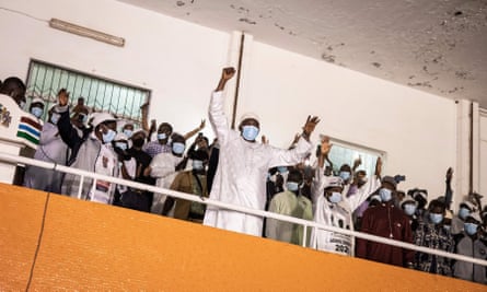 Gambia’s newly re-elected president, Adama Barrow, waves to his supporters after winning the presidential elections in Banjul