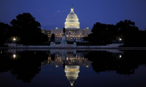 The US Capitol is reflected in the reflecting pool at the West Front in Washington DC.