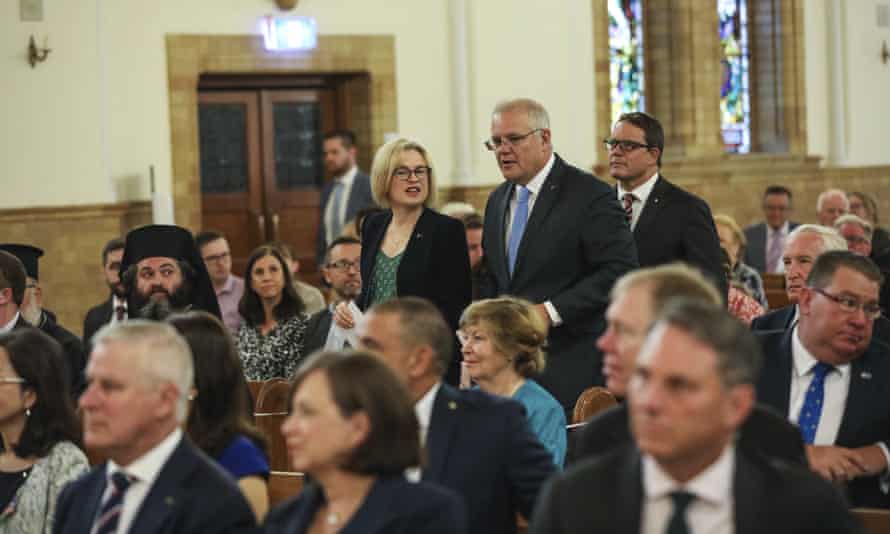 Amanda Stoker and Scott Morrison arrive to a church service for the commencement of parliament at St Christopher’s Cathedral in Canberra