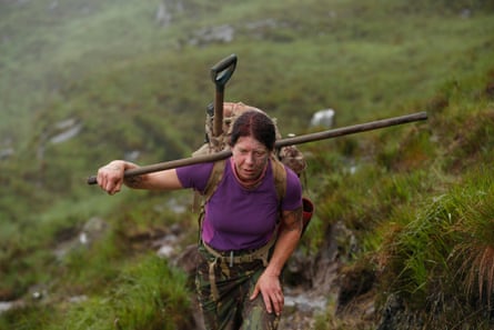 'It suits the strong spirit': Scottish mountain trail builders - photo essay | UK news 8 Nan Morris (ponytail)