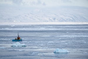 Fishing boat in icy sea