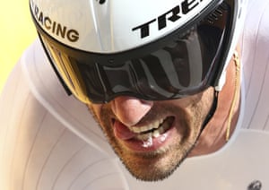 Fabian Cancellara strains as he finishes third,six seconds off the pace