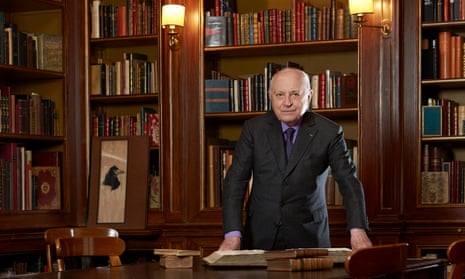 Pierre Bergé in his library