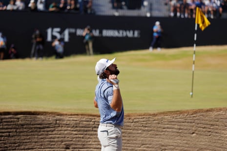 Cameron Young reacts to nearly chipping in from the bunker on the 18th.