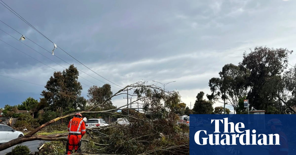 Thousands without power in Queensland as Victoria experiences ‘terrifying’ winds after year’s wettest day