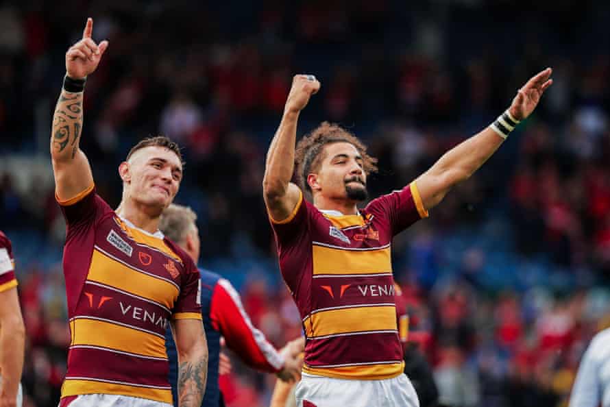 Danny Levi of the Huddersfield Giants (left) and Ashton Golding celebrate the victory over Hull KR and advance to the Challenge Cup final.
