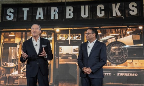 Howard Schultz, left, speaks after introducing incoming CEO, Laxman Narasimhan, in Seattle last year.