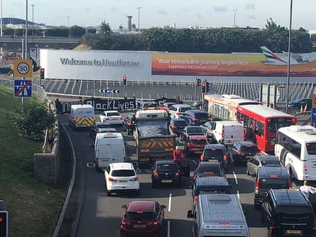 Protesters block the road leading to Heathrow.