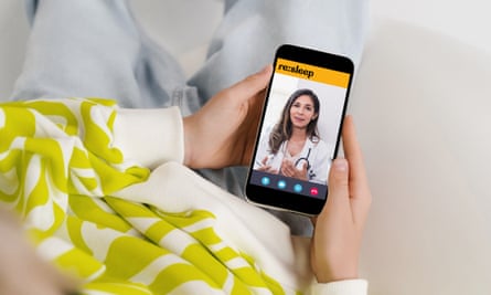 Hands hold a smartphone that is displaying the Re:Sleep training app