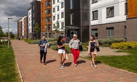 College lane accommodation with a group of students walking past.