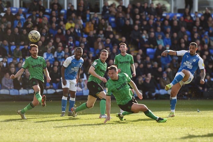 Jonson Clarke-Harris of Peterborough United scores his team’s equaliser.