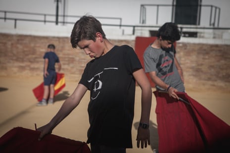 Classes in Venta de Antequera in Seville. Boys during bullfight classes learn how to move and how to behave like a bullfighter