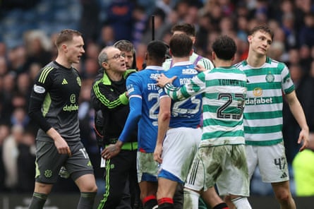 Celtic manager Martin O’Neill intervenes as players from both teams exchange words at the end of the match.