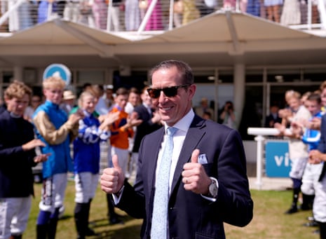 Jockey Jim Crowley is greeted by fellow jockeys after he announced his retirement.