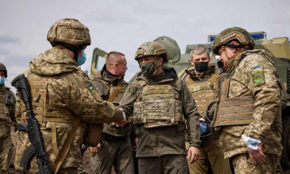 Ukrainian president Volodymyr Zelenskiy visited the frontlines on Thursday, saying: ‘I want to be with our soldiers in the tough times in Donbas’