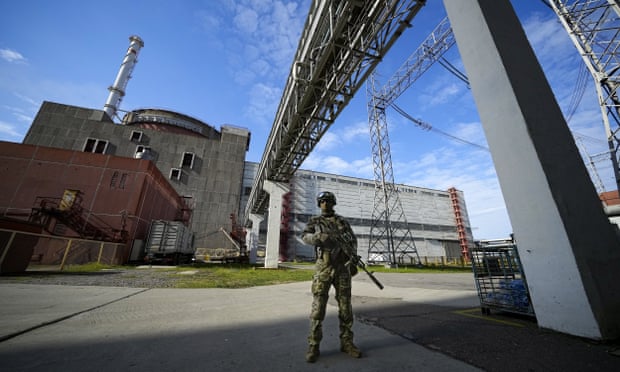 A Russian serviceman on guard at the Zaporizhzhia nuclear power station