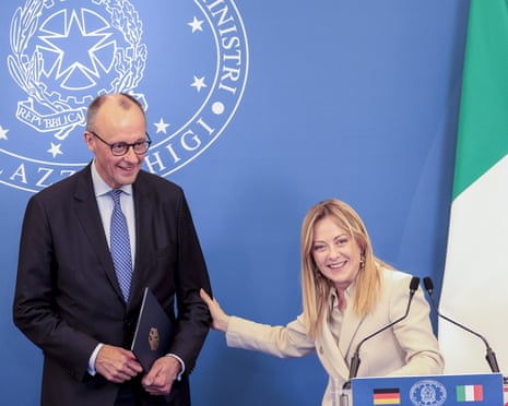 German chancellor Friedrich Merz (L) and Italian premier Giorgia Meloni (R) smile at the end of their joint press conference following Italy-Germany intergovernmental summit at Villa Doria Pamphili in Rome, Italy last month.