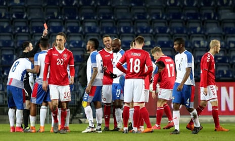 Panama’s Blas Perez is sent off by the Irish referee Neil Doyle for a foul on Kasper Schmeichel in their 1-0 loss in Denmark.